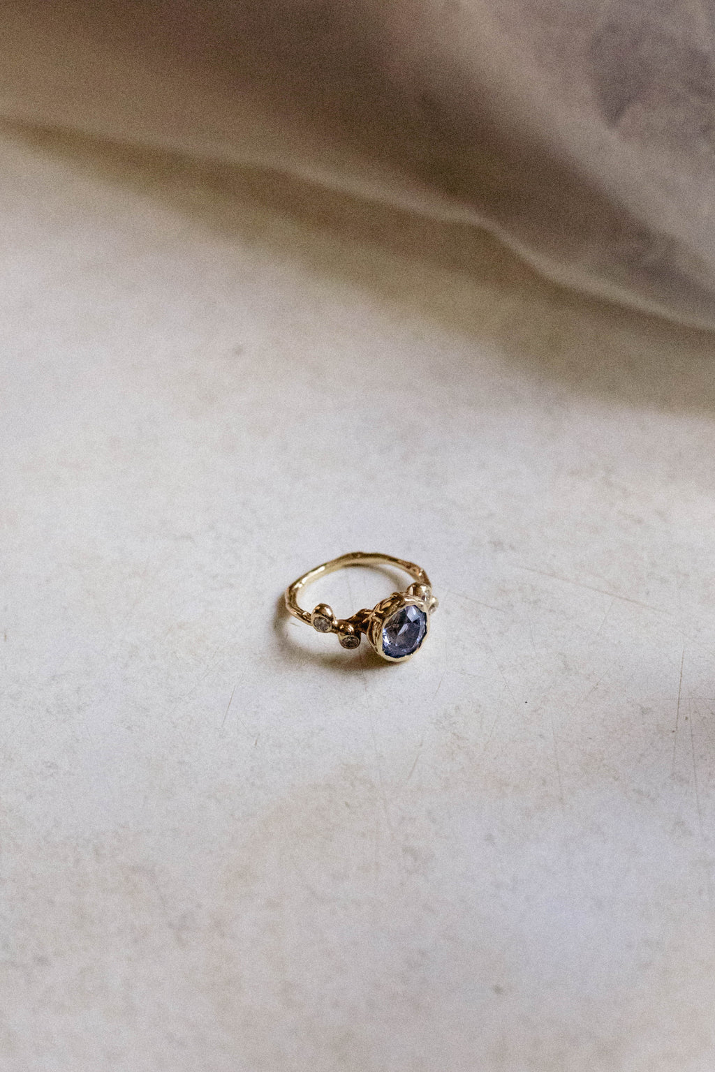 Oval Sapphire and Diamond Cluster Ring