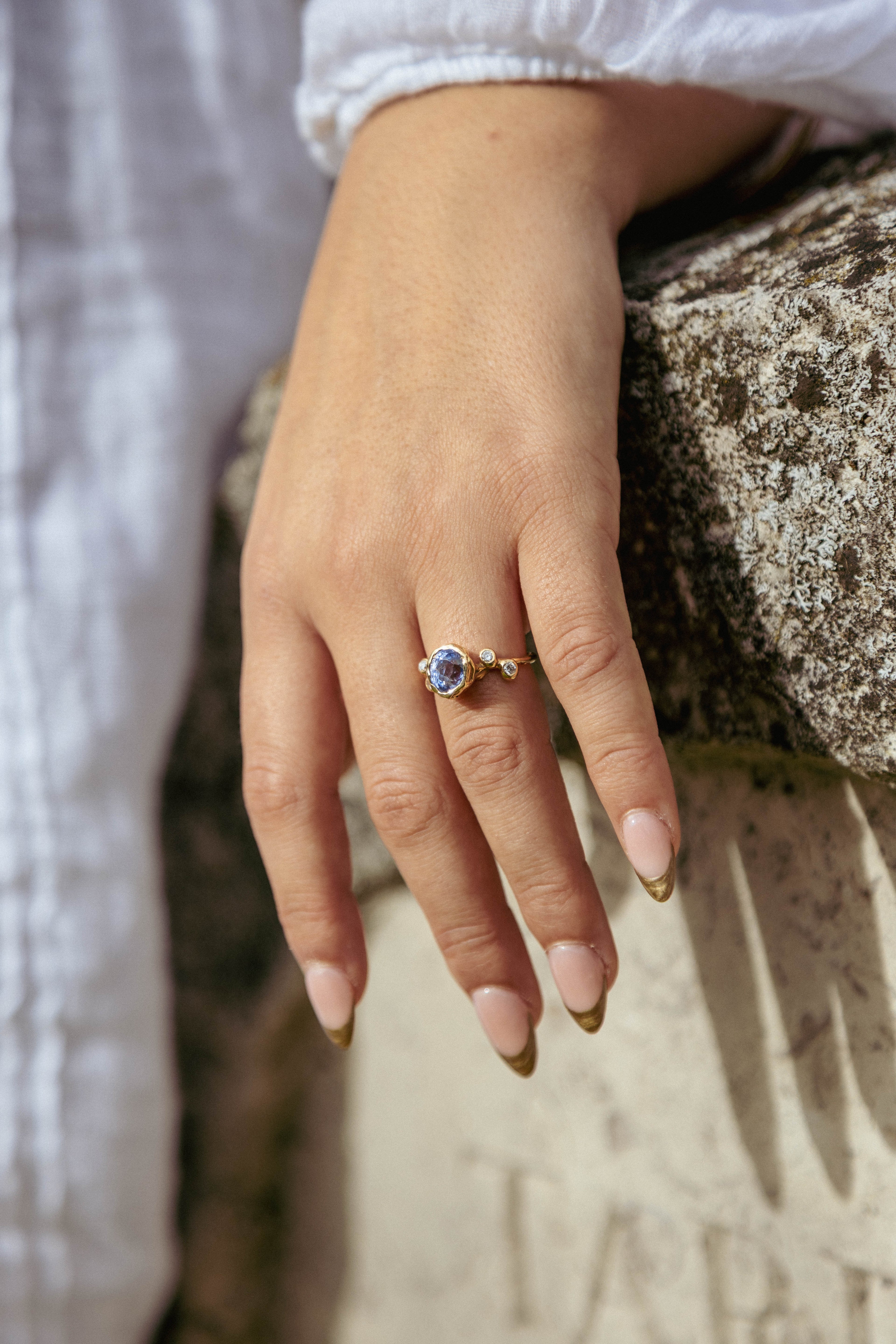 Oval Sapphire and Diamond Cluster Ring