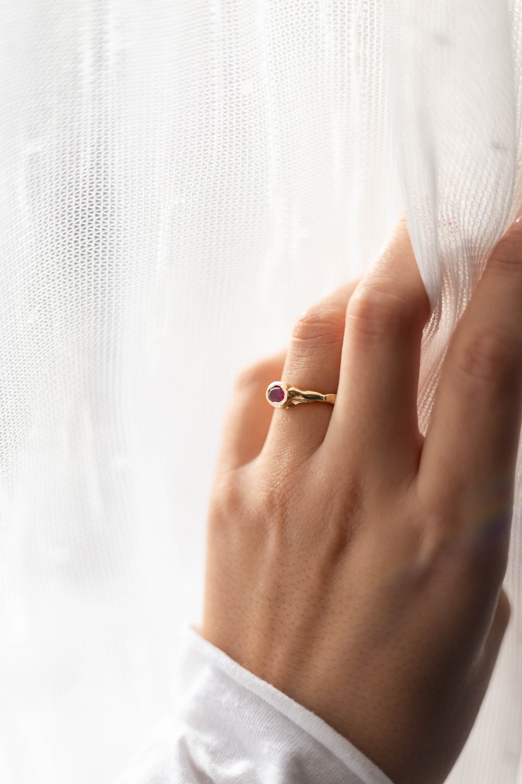 Oval Ruby Solitaire Ring